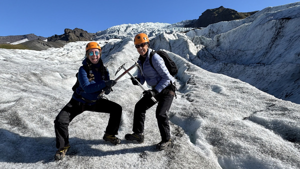 Walking on a glacier with a buddy in Iceland